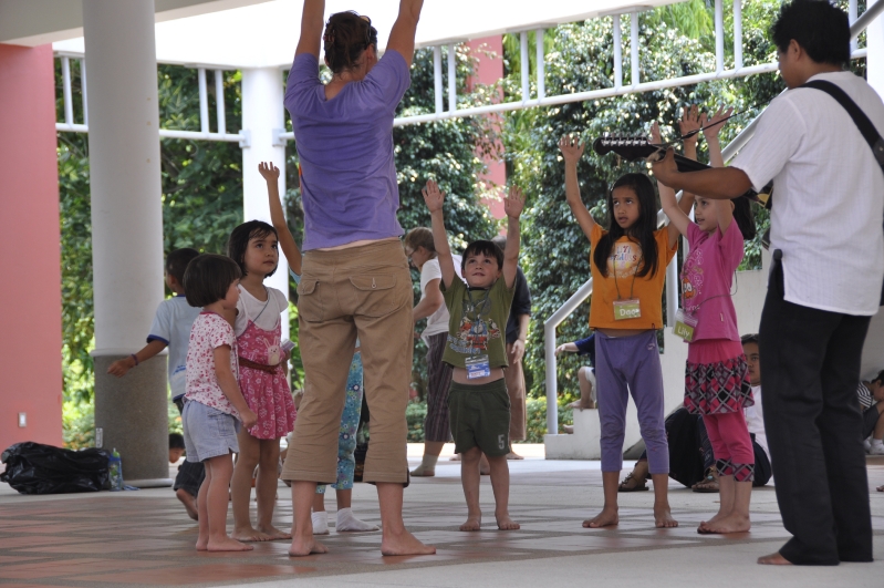 Teacher and students at outdoor music class