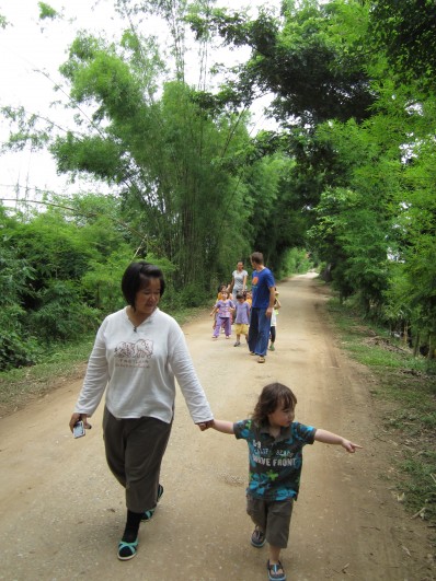 Panyaden School Teacher with student on nature walk