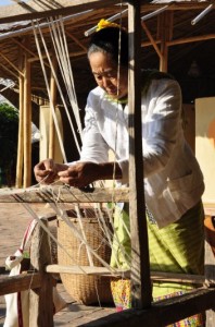 _DSC8521 Preparing cotton yarn for the loom before weaving. Cotton project by Panyaden School