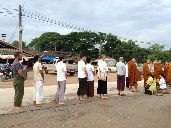 Panyaden staff go on morning alms round with the monks