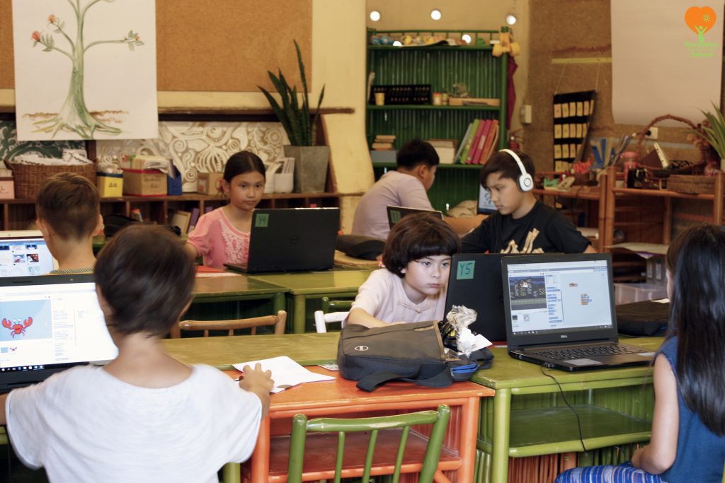 Live and Learn: Screen time for child. Students in computer class, Panyaden International School