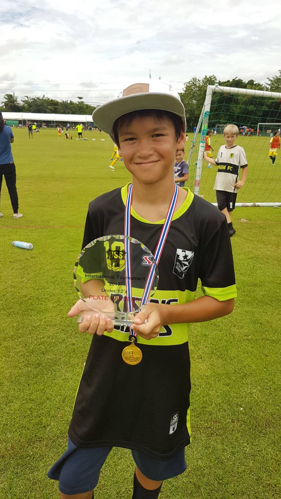 Panyaden student Din with his soccer medal