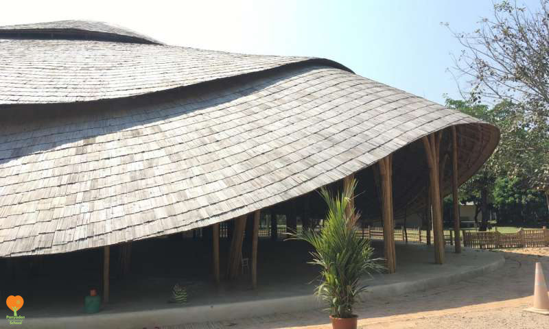 Panyaden bamboo sports hall side view by Chiangmai Life Architects