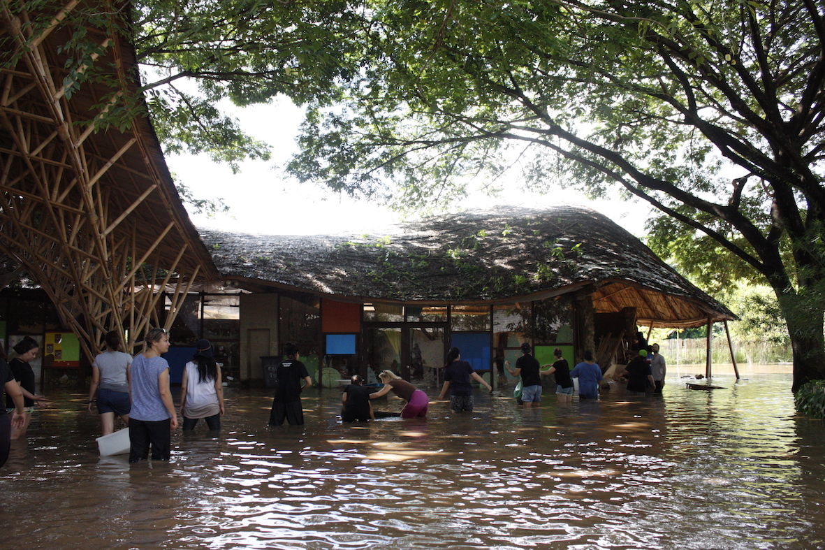 Teachers and staff help out during flood at Panyaden